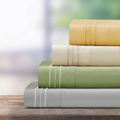 Transformez votre chambre d'enfant en une retraite confortable avec un ensemble de draps brodés en 3 lignes