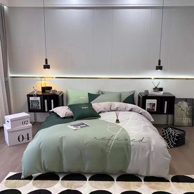 Couverture de lit en coton d'aloe en quatre pièces pour la peau